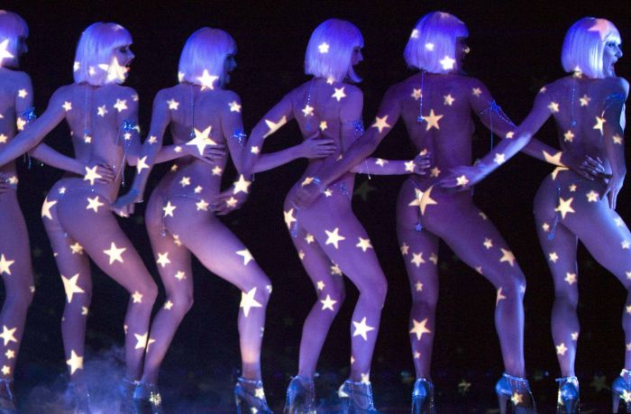 Performers are seen on stage during a rehearsal at the Crazy Horse cabaret in Paris on January 28, 2009. REUTERS/Charles Platiau (FRANCE) TEMPLATE OUT. FOR EDITORIAL USE ONLY. NOT FOR SALE FOR MARKETING OR ADVERTISING CAMPAIGNS.